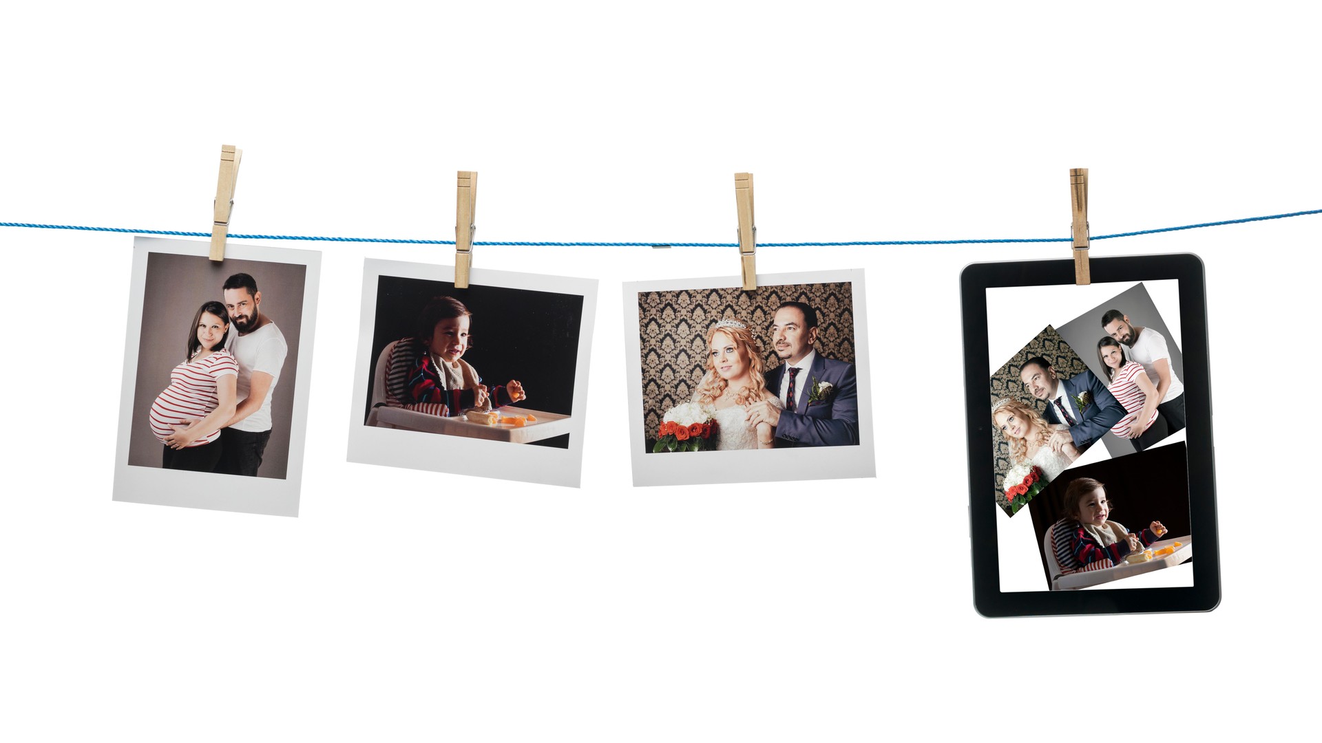 Instant photo prints hanged on string and digital tablet